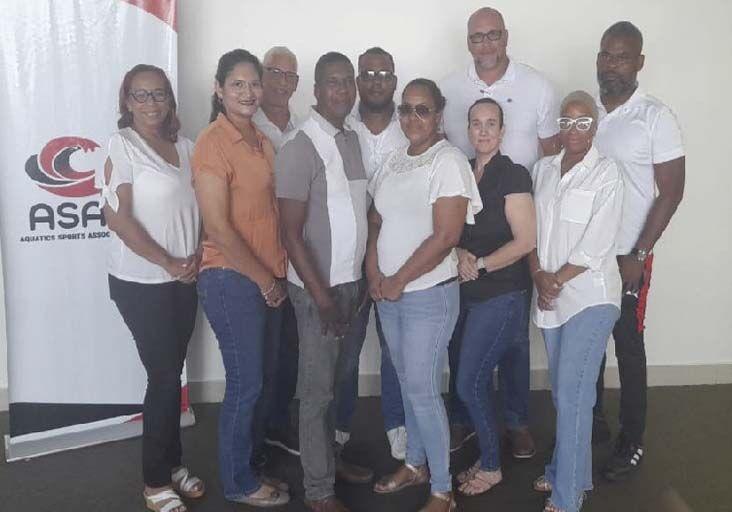 NEW TEAM: The new executive of the Aquatics Sports Association of Trinidad and Tobago (ASATT) was elected yesterday at the National Aquatics Centre, Balmain, Couva. They are, back row from left, Paul Newallo (first vice-president), Shawn Pouchet (president), William Carr (third vice president) and Jason Wickham (community relations officer); front row from left, Gresha Gonzalez (ordinary member), Dinnora-Gil Anthony (secretary), Stephen Mendoza (second vice president), Marlene Blaire-Belfon (assistant treasurer/secretary), Robyn Freeman (treasurer), and Kamimura Alexander (marketing). —Photo courtesy KEITH MATAMORO (Image obtained at trinidadexpress.com)