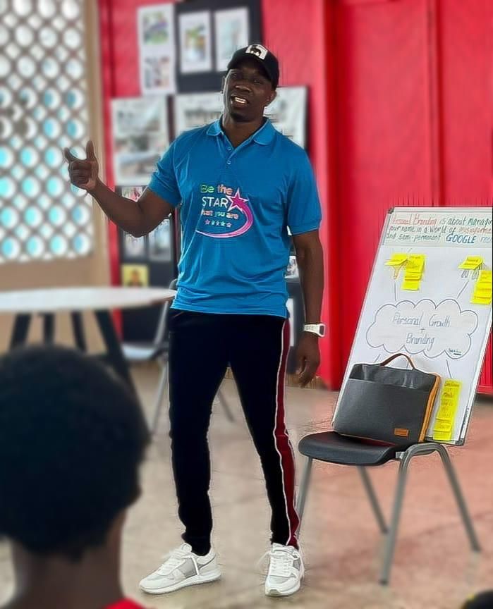 Dwayne Bravo...speaking to youths at St Mary's Home, last year. (Image obtained at guardian.co.tt)