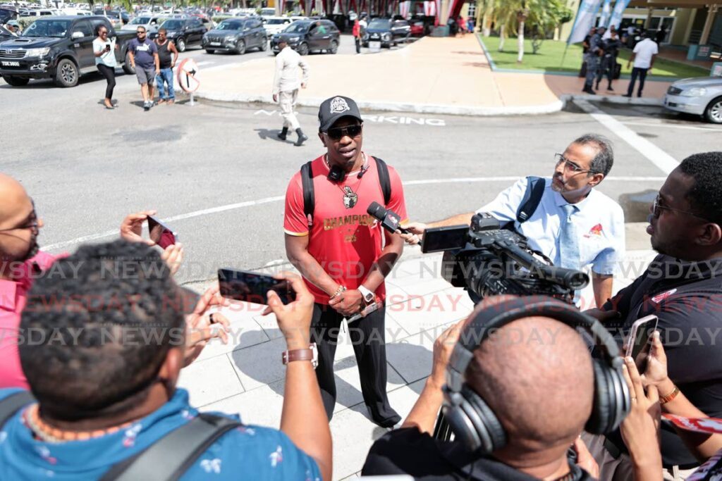 Trinbago Knight Riders’ coach Dwayne Bravo speaks with the media on his team’s return to TT, at the Piarco International Airport, on September 22, following their win against Guyana Amazon Warriors, at the Guyana National Stadium, Providence, on September 21. - Photo by Lincoln Holder (Image obtained at newsday.co.tt)